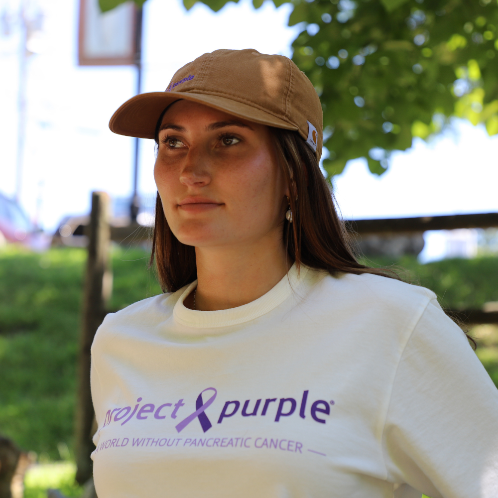 girl with white project purple shirt