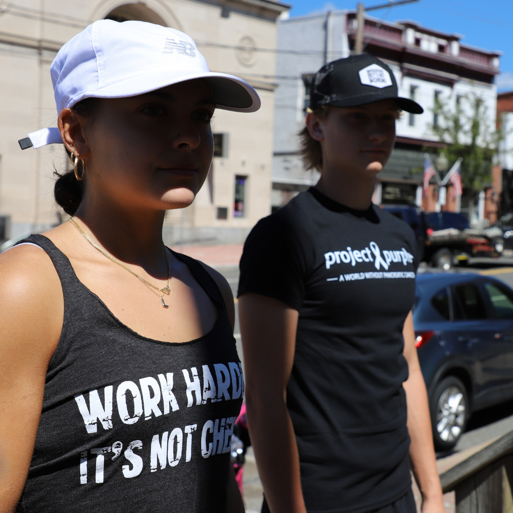 Girl and boy wear black shirts