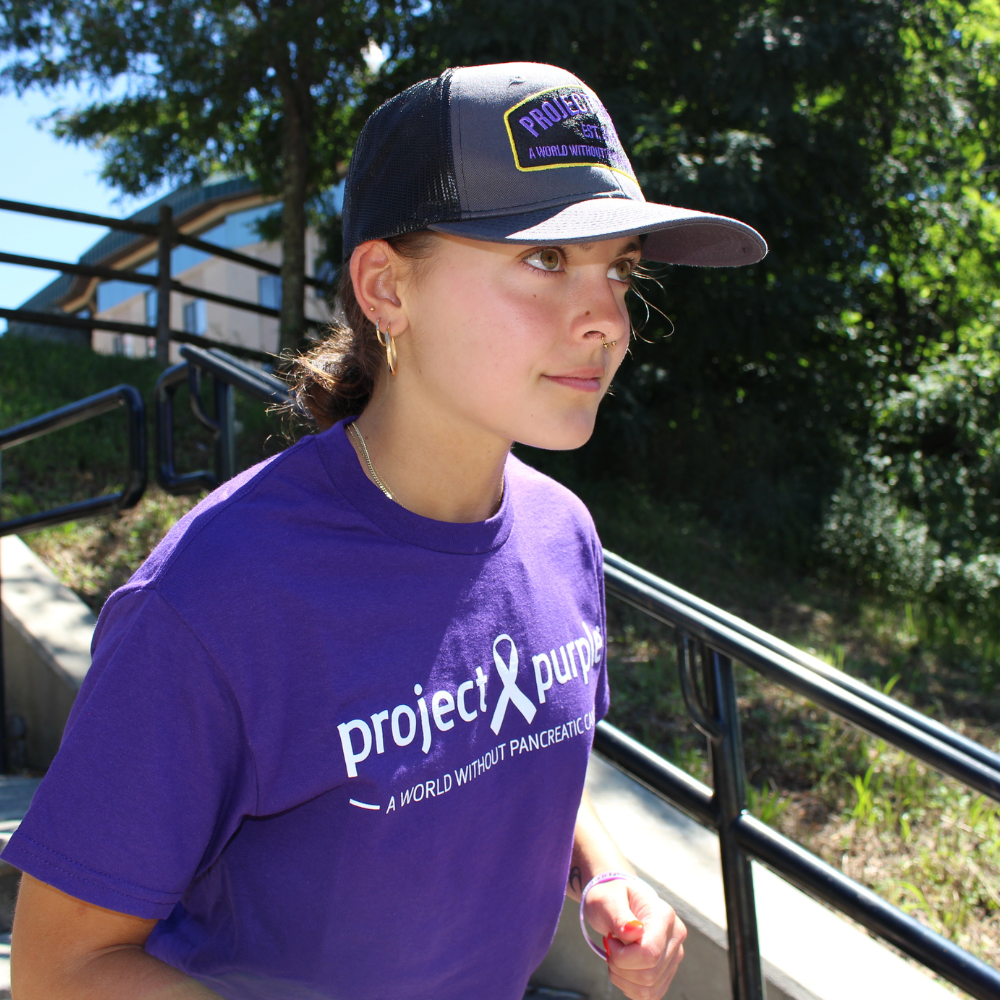 girl running with purple shirt