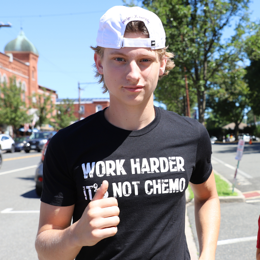 boy running in work harder tee