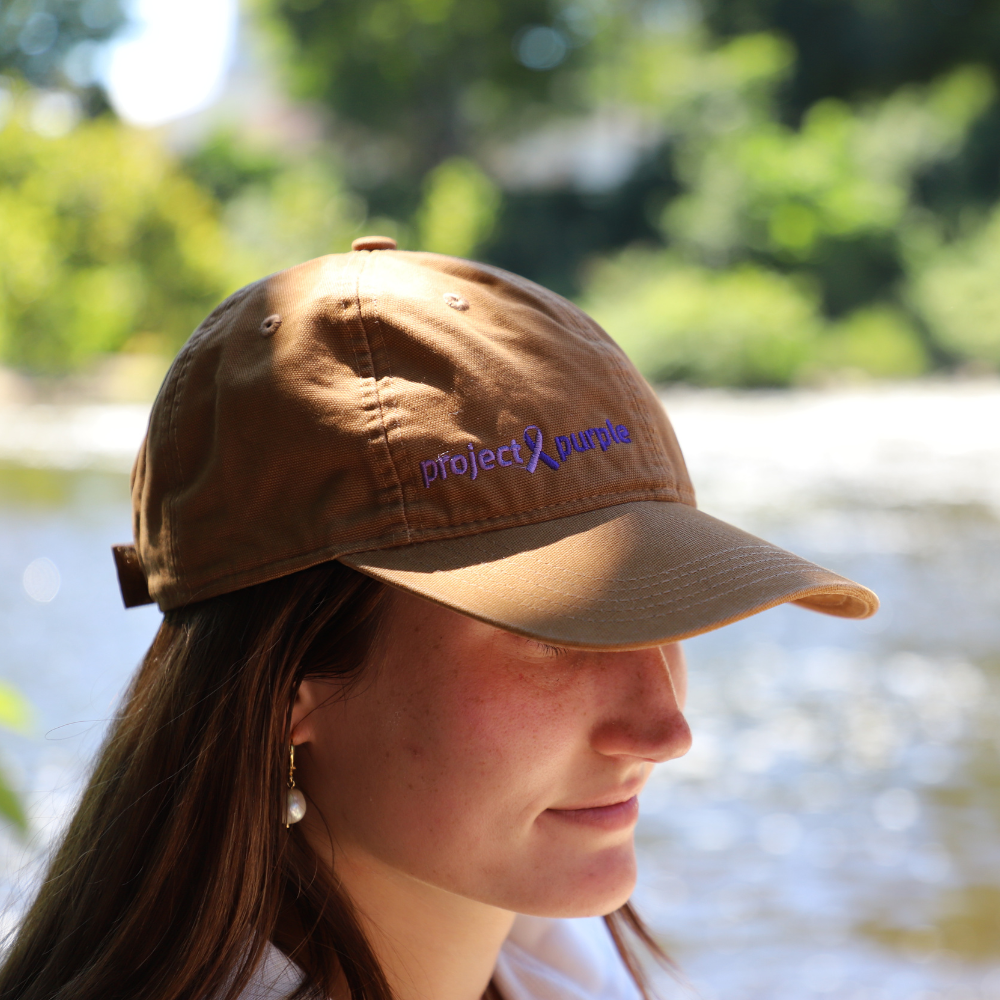 top view of project purple carhartt hat