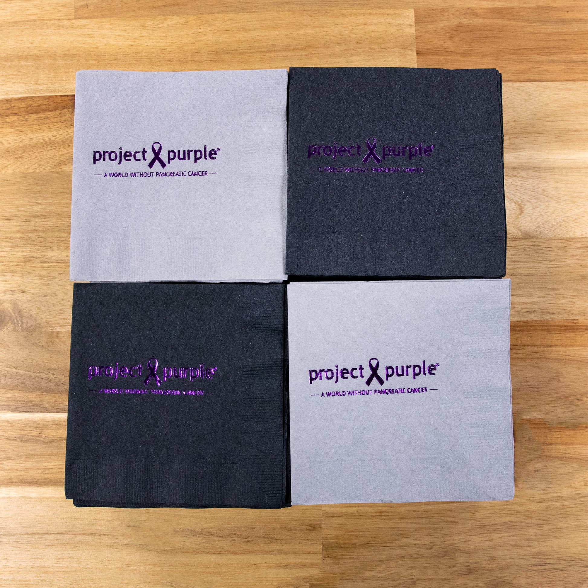 gray and black napkins with project purple logo