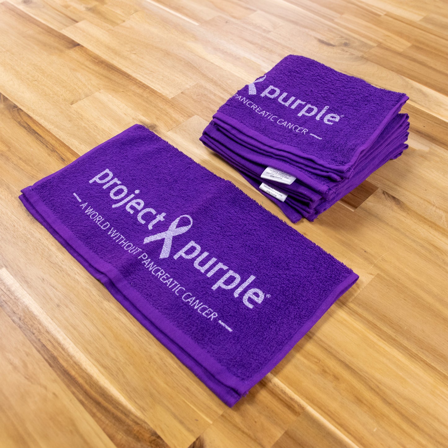 Purple towel with logo